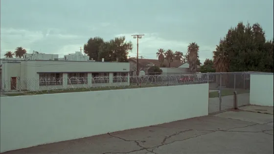 A razor-wire perimeter fence outside a Southern California juvenile detention facility